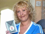 Jayne with one of the cards she has received from America